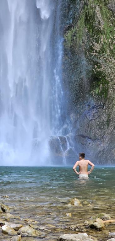 Young swimmer braving the cold April waters